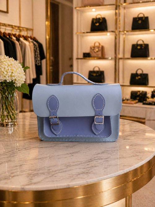 Blueberry Delite Satchel in pastel blue with vintage-inspired buckle accents